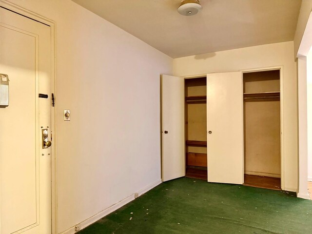 unfurnished bedroom featuring a closet