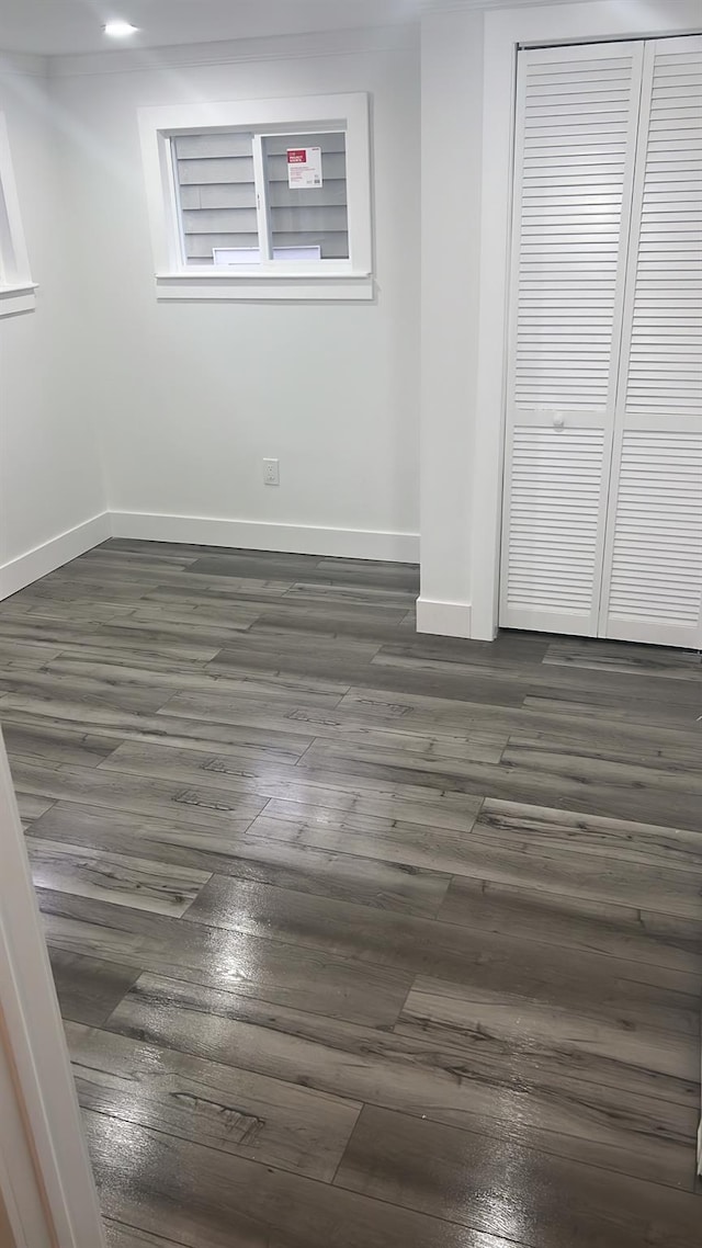 unfurnished room featuring dark hardwood / wood-style floors