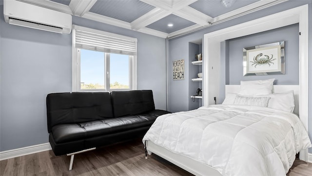 bedroom featuring a wall mounted air conditioner, coffered ceiling, hardwood / wood-style flooring, ornamental molding, and beamed ceiling