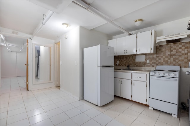 kitchen featuring white cabinetry, sink, ventilation hood, white refrigerator, and range