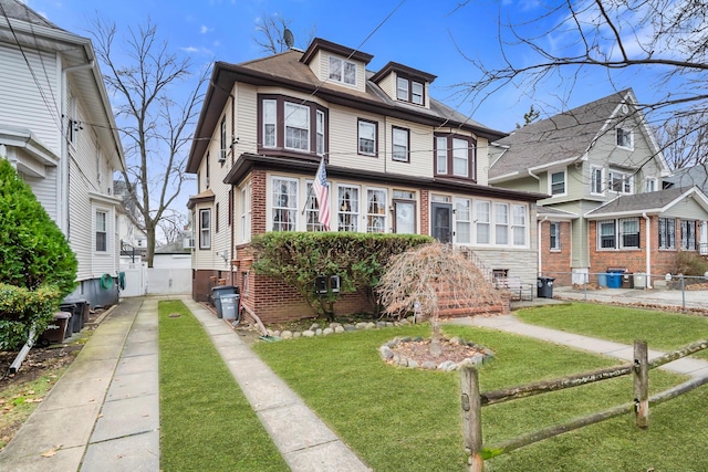 view of front of property with a front lawn