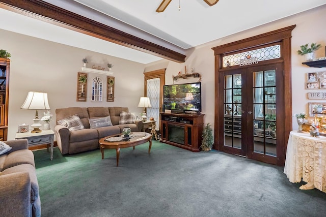 living room featuring beam ceiling, dark carpet, french doors, and ceiling fan