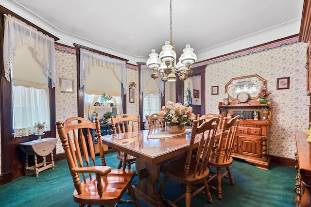 dining space featuring dark colored carpet and a notable chandelier