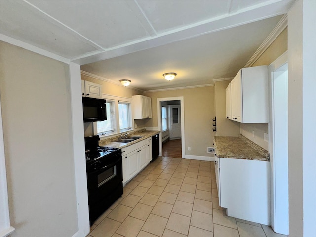 kitchen featuring light tile patterned flooring, sink, white cabinets, and black appliances