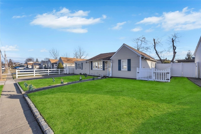 view of front of home with a front lawn