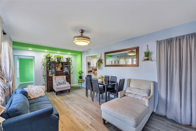 living room with light hardwood / wood-style floors