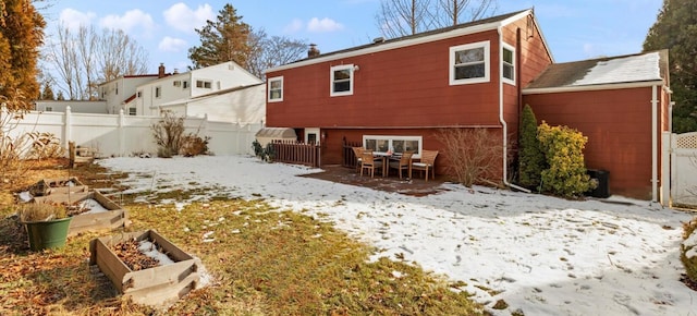 view of snow covered property