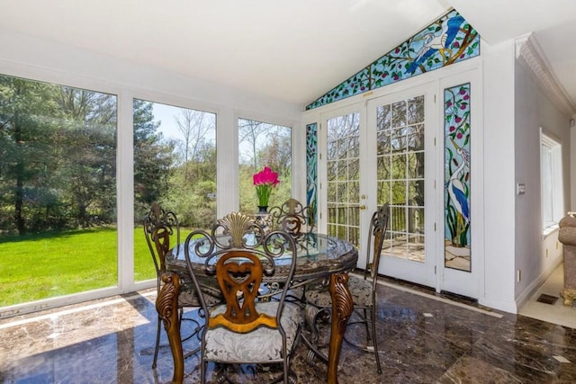 sunroom / solarium with french doors and lofted ceiling