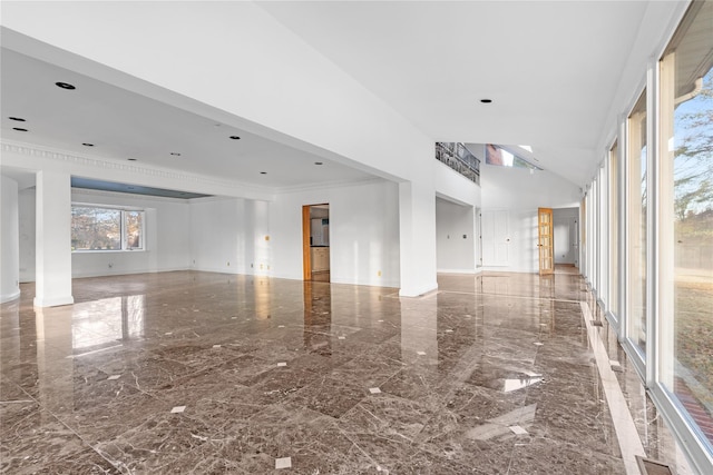 unfurnished room featuring crown molding