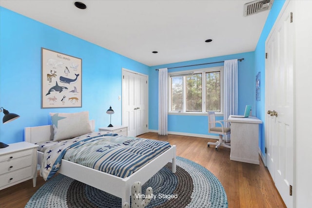 bedroom featuring hardwood / wood-style floors