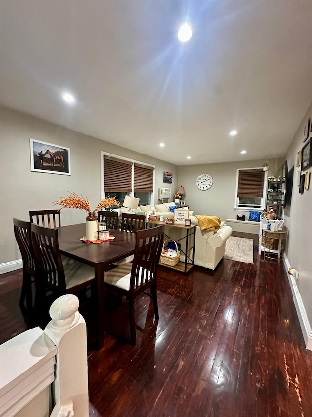 dining room with wood-type flooring