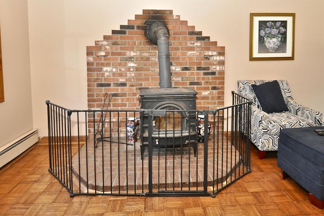 details with a wood stove, baseboard heating, and parquet floors