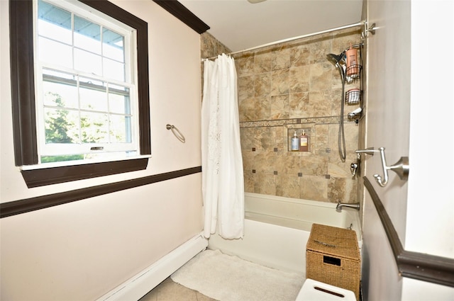 bathroom with shower / bath combo with shower curtain