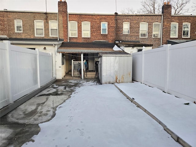 view of snow covered property