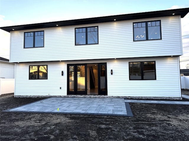 rear view of house featuring a patio