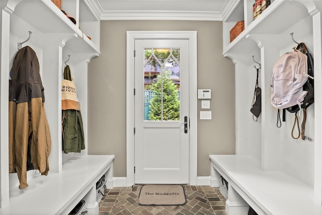 mudroom featuring ornamental molding