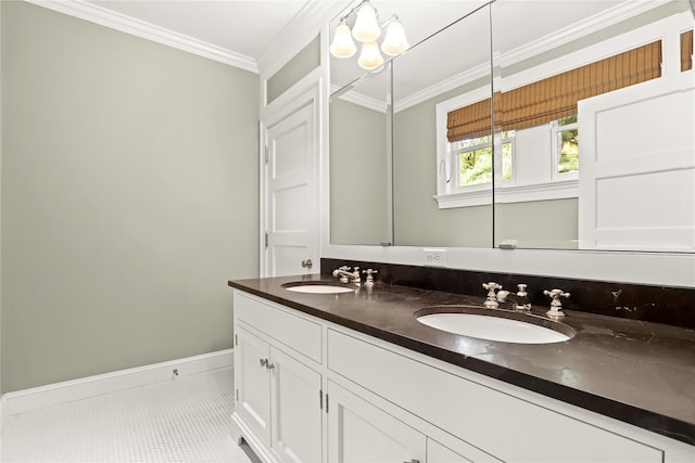 bathroom featuring tile patterned floors, vanity, and crown molding