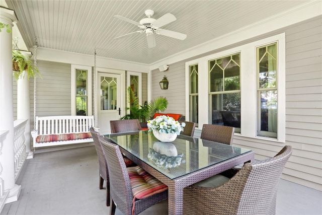 sunroom / solarium with ceiling fan