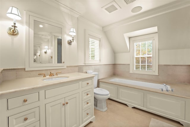 bathroom with vanity, crown molding, tile patterned flooring, a washtub, and toilet