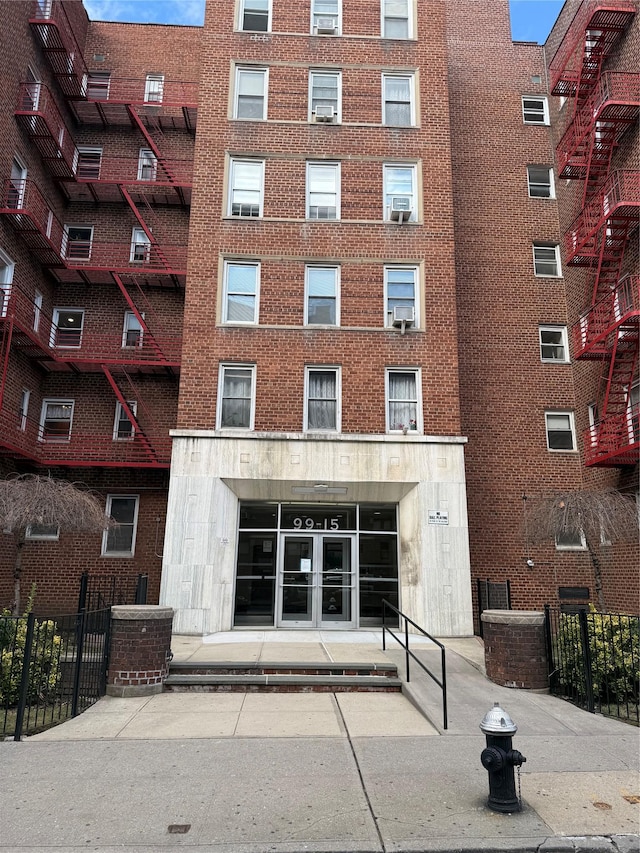 view of building exterior with cooling unit