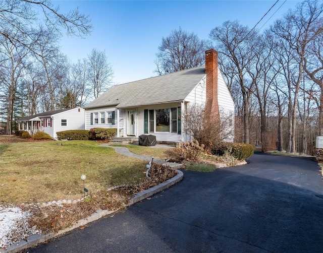 ranch-style house with a front yard