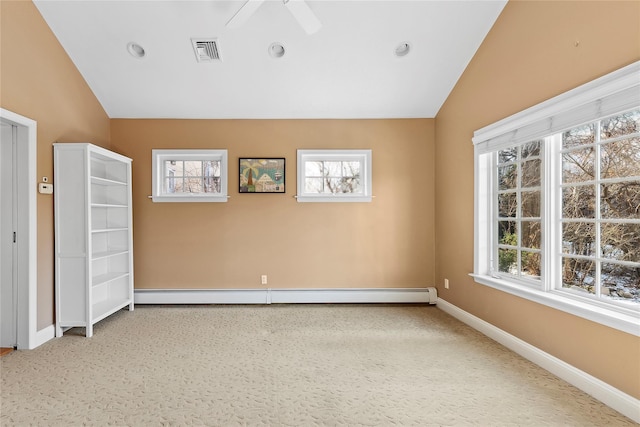 carpeted spare room with a wealth of natural light, ceiling fan, a baseboard radiator, and lofted ceiling