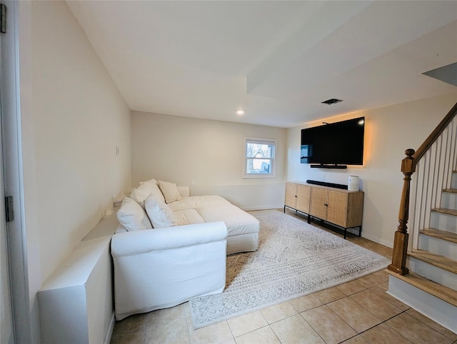 living room featuring light tile patterned flooring