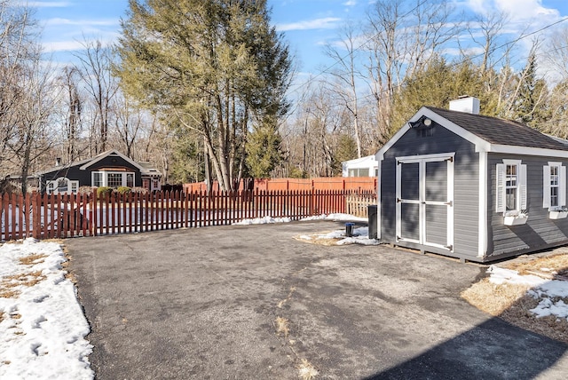 exterior space with a storage shed