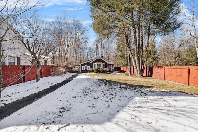 view of yard covered in snow