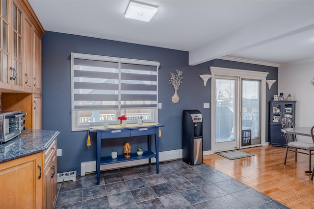 interior space featuring crown molding, beamed ceiling, and dark hardwood / wood-style floors