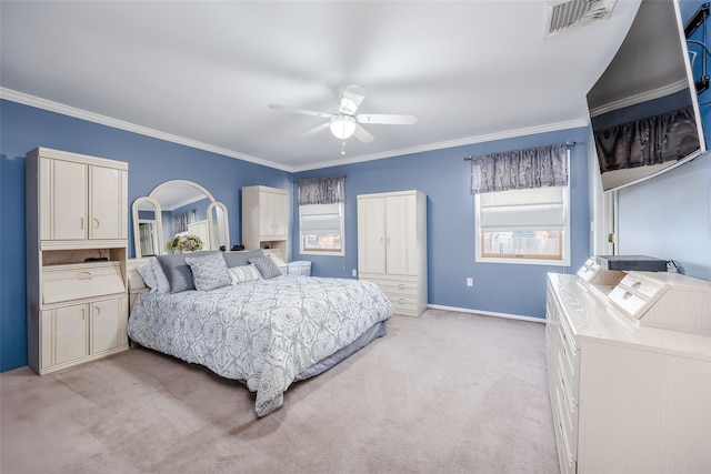 bedroom with ceiling fan, light colored carpet, and ornamental molding