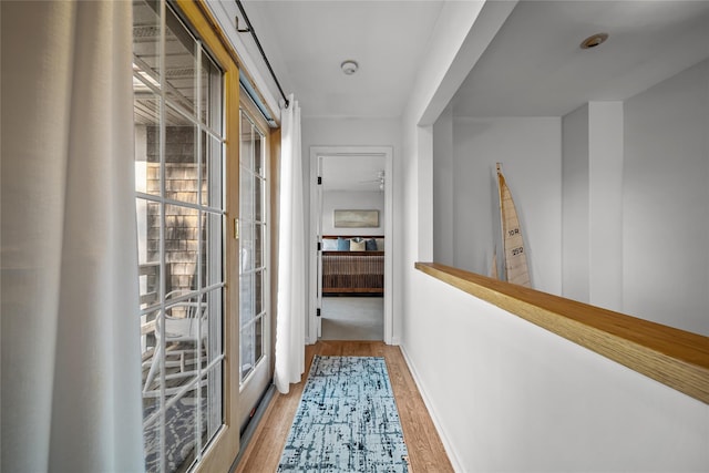 hallway featuring light hardwood / wood-style flooring