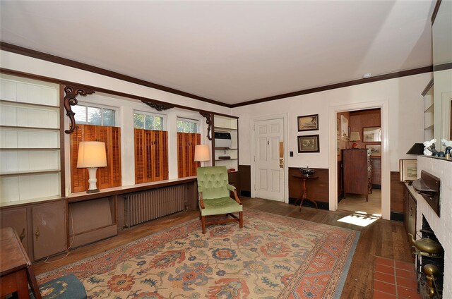 living room featuring an AC wall unit and dark wood-type flooring