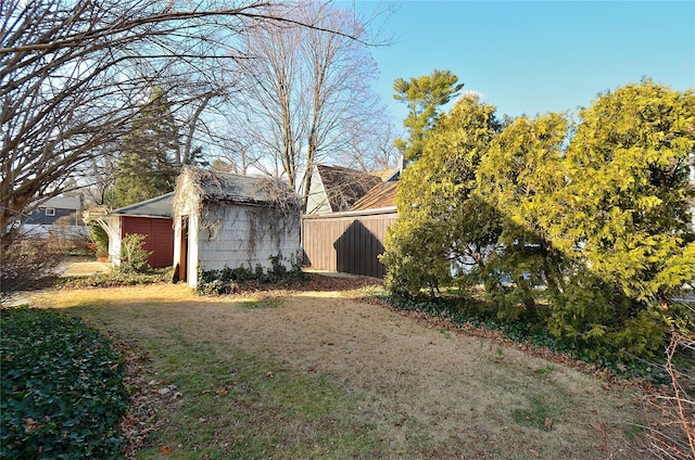 view of property exterior with a lawn