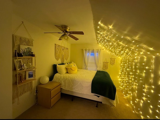 carpeted bedroom featuring ceiling fan