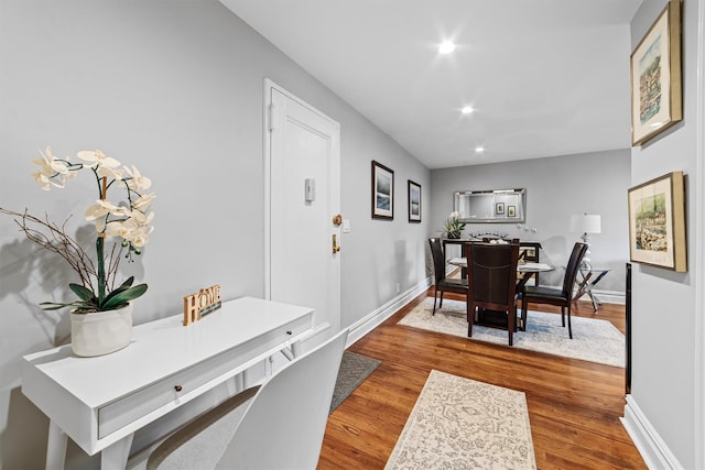 dining area with wood-type flooring