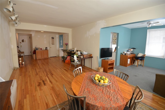 dining room featuring light wood-type flooring and ceiling fan