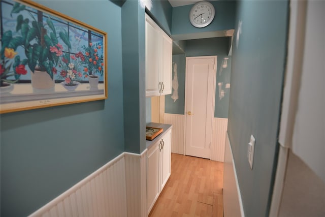 corridor featuring light hardwood / wood-style flooring