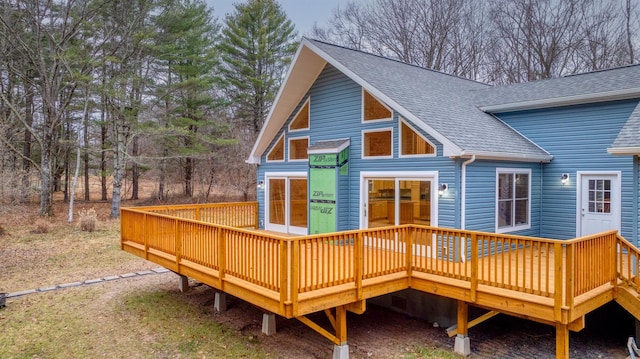 rear view of property with a deck