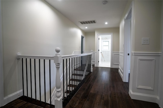 hallway featuring dark hardwood / wood-style flooring