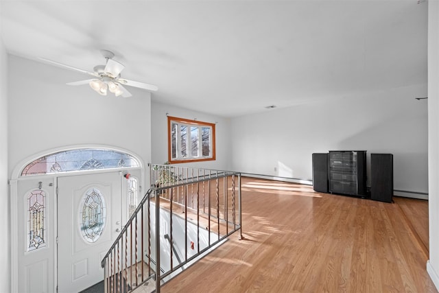 interior space featuring hardwood / wood-style flooring and a baseboard radiator