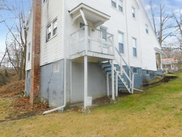 view of property exterior featuring a yard