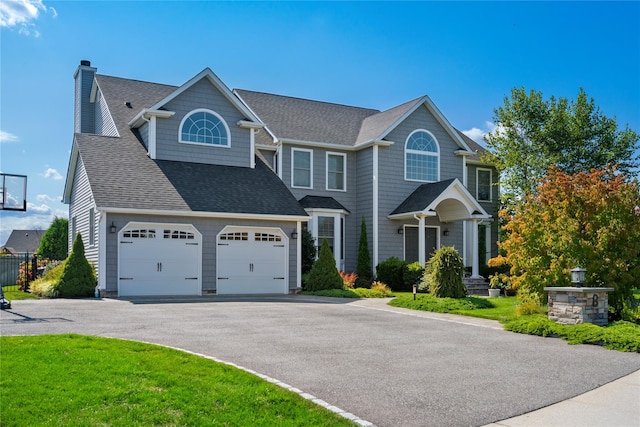 view of front of property featuring a garage