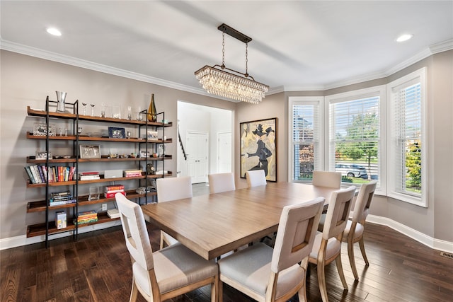 dining room with crown molding, a chandelier, and dark hardwood / wood-style floors