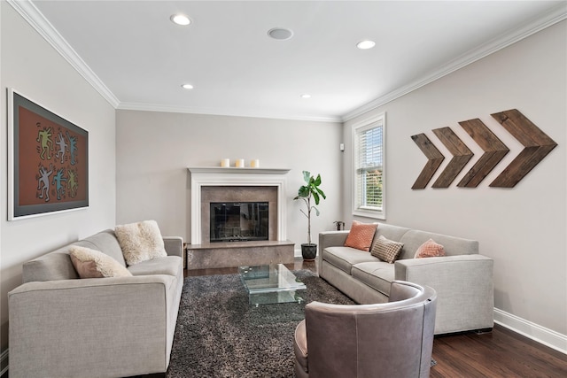 living room featuring crown molding, a premium fireplace, and dark wood-type flooring