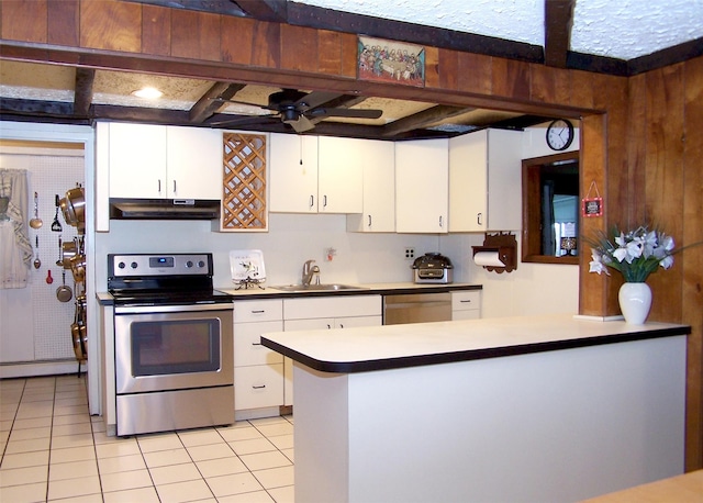 kitchen with ceiling fan, sink, light tile patterned floors, white cabinets, and appliances with stainless steel finishes