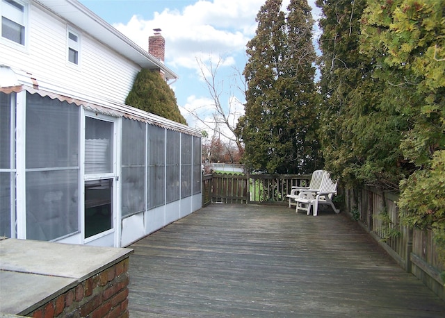 wooden terrace with a sunroom