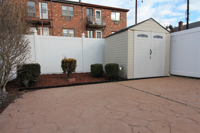 exterior space with a storage unit