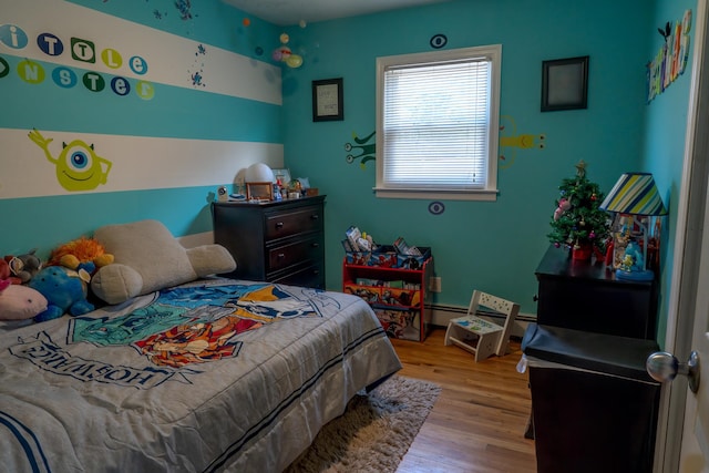 bedroom with light hardwood / wood-style floors