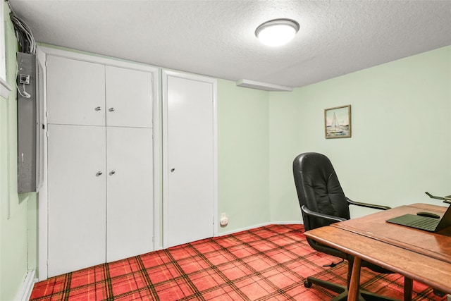 office area featuring a textured ceiling